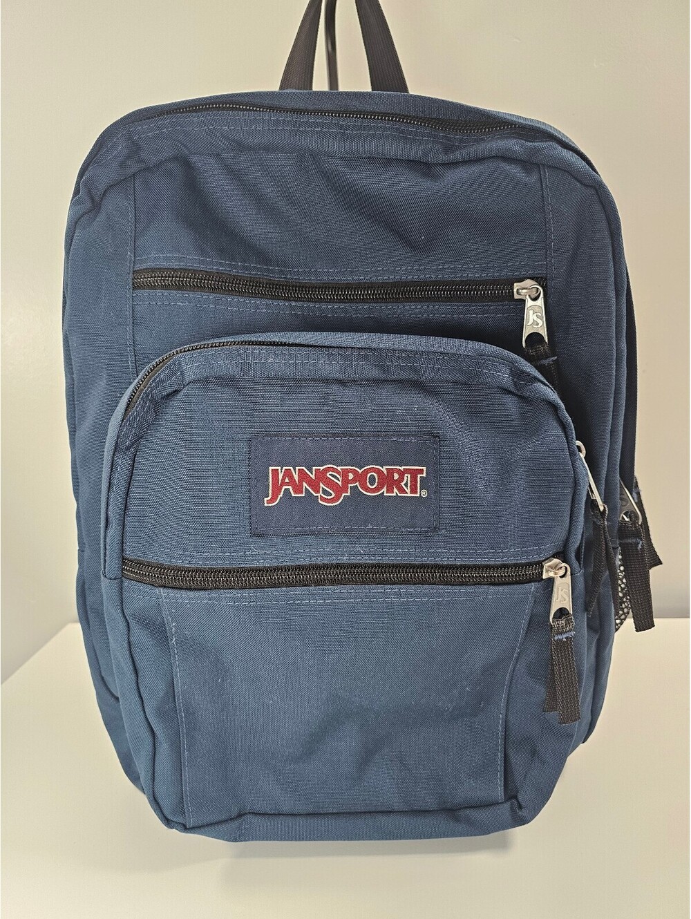 JanSport Classic Navy Blue Backpack with Multiple Compartments